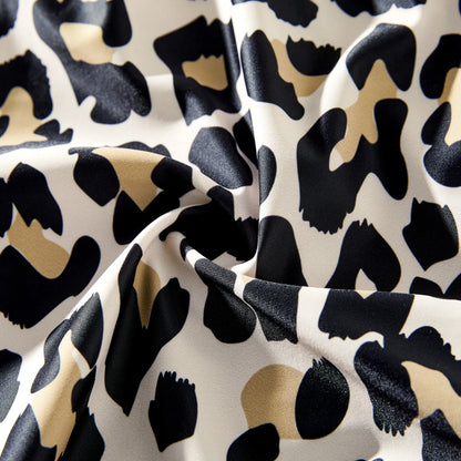Family matching leopard print summer outfits, great for poolside or beach activities