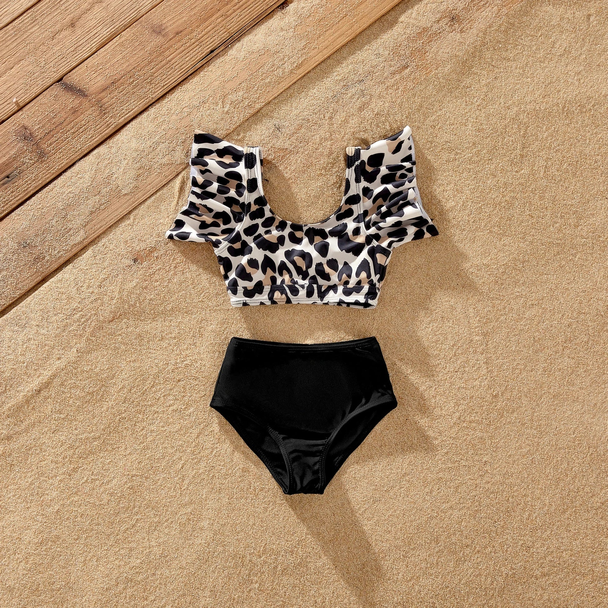 Family matching leopard print beach outfits, embracing summer fashion trends