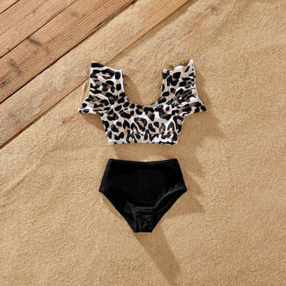 Family matching leopard print beach outfits, embracing summer fashion trends