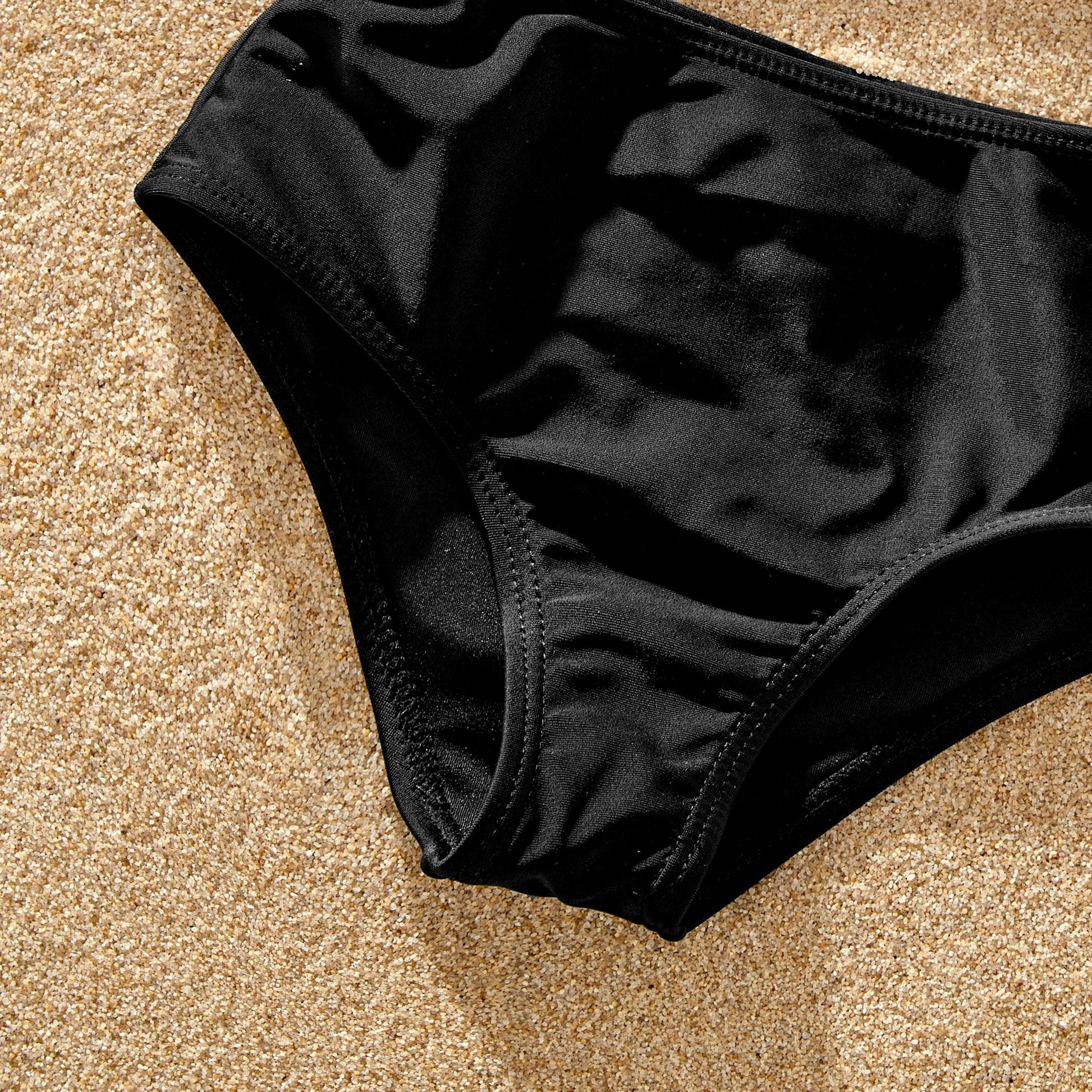Leopard print matching swimsuits for men, women, and kids, suitable for any vacation