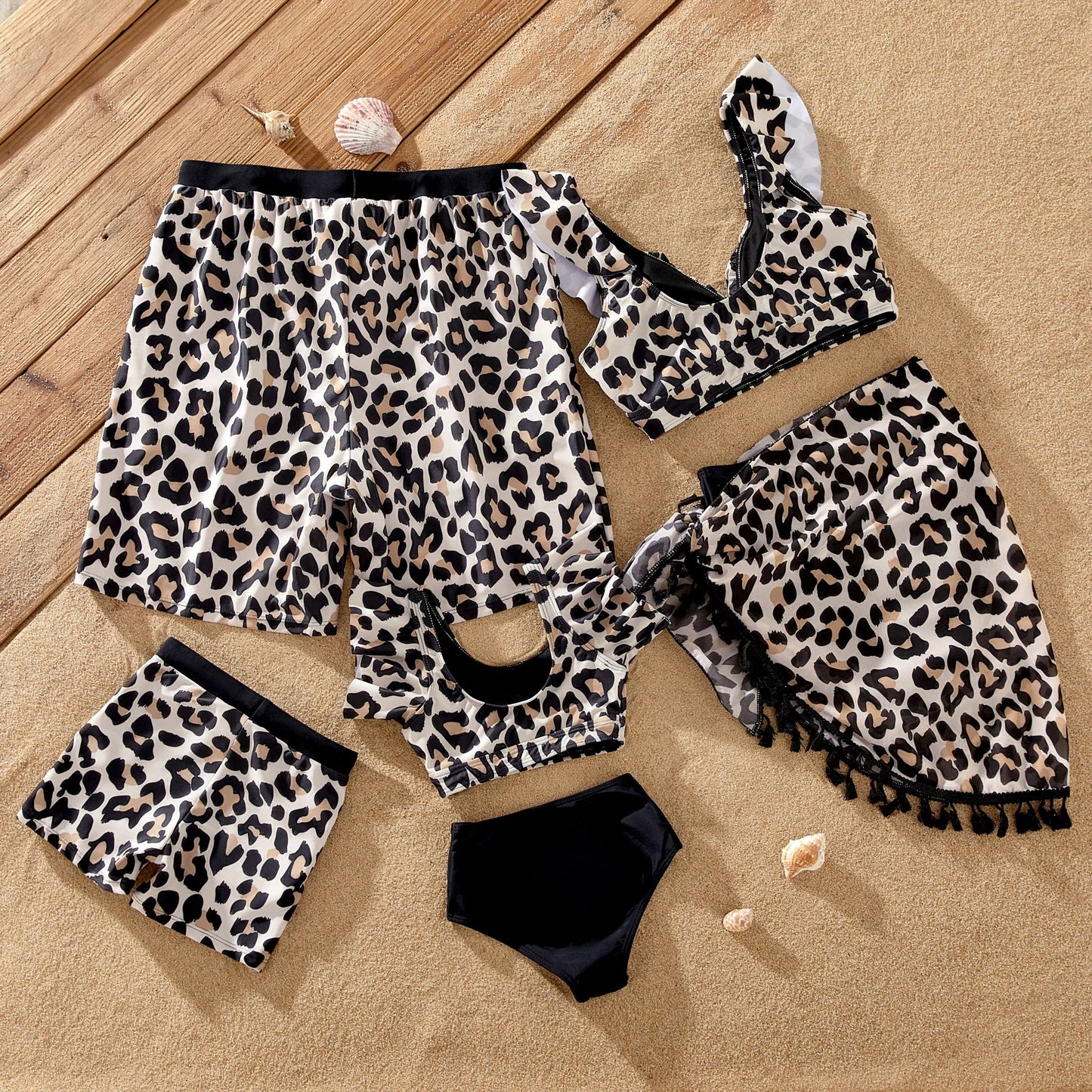 Leopard print family swimsuits for poolside fashion, including women's bikini and kids' styles