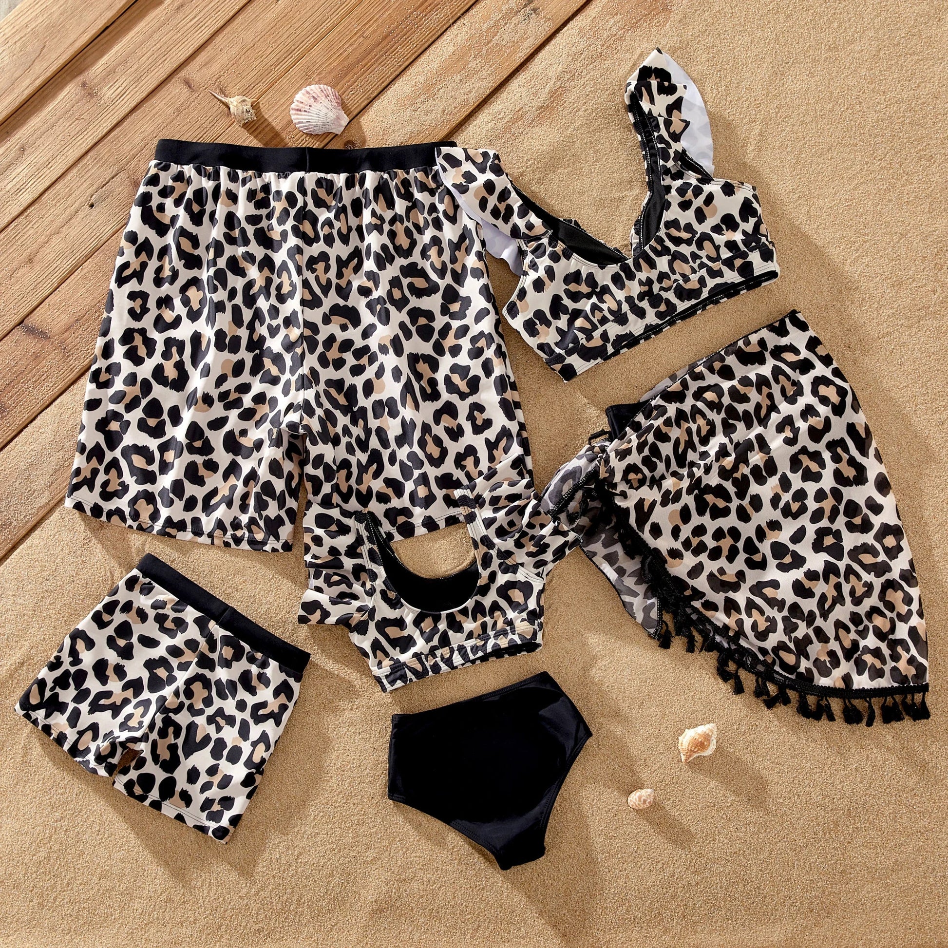 Leopard print family swimsuits for poolside fashion, including women's bikini and kids' styles