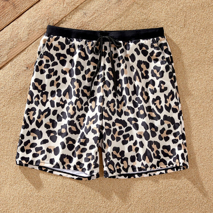 Family matching leopard print beachwear, ensuring everyone looks great by the water