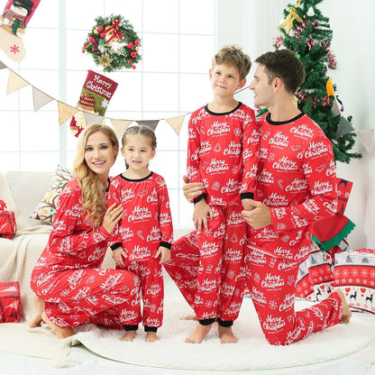 Family in matching long sleeve green Christmas pajamas with holiday prints, comfortable parent child clothes
