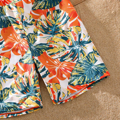 Orange tropical print swimwear: matching outfits for your next family pool party.
