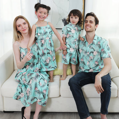 Coordinated casual apparel: family of three in blue chiffon blend clothing, perfect for everyday family wear and photos.