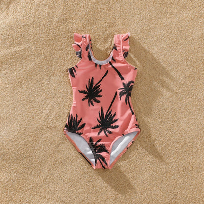 Dad and son matching pink swim shorts with coconut tree print, summer swimwear