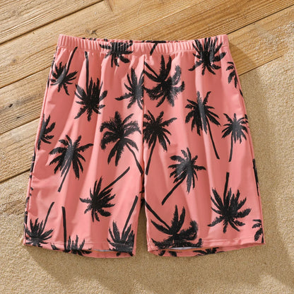 Tropical pink family swimwear set featuring coconut tree pattern for vacation