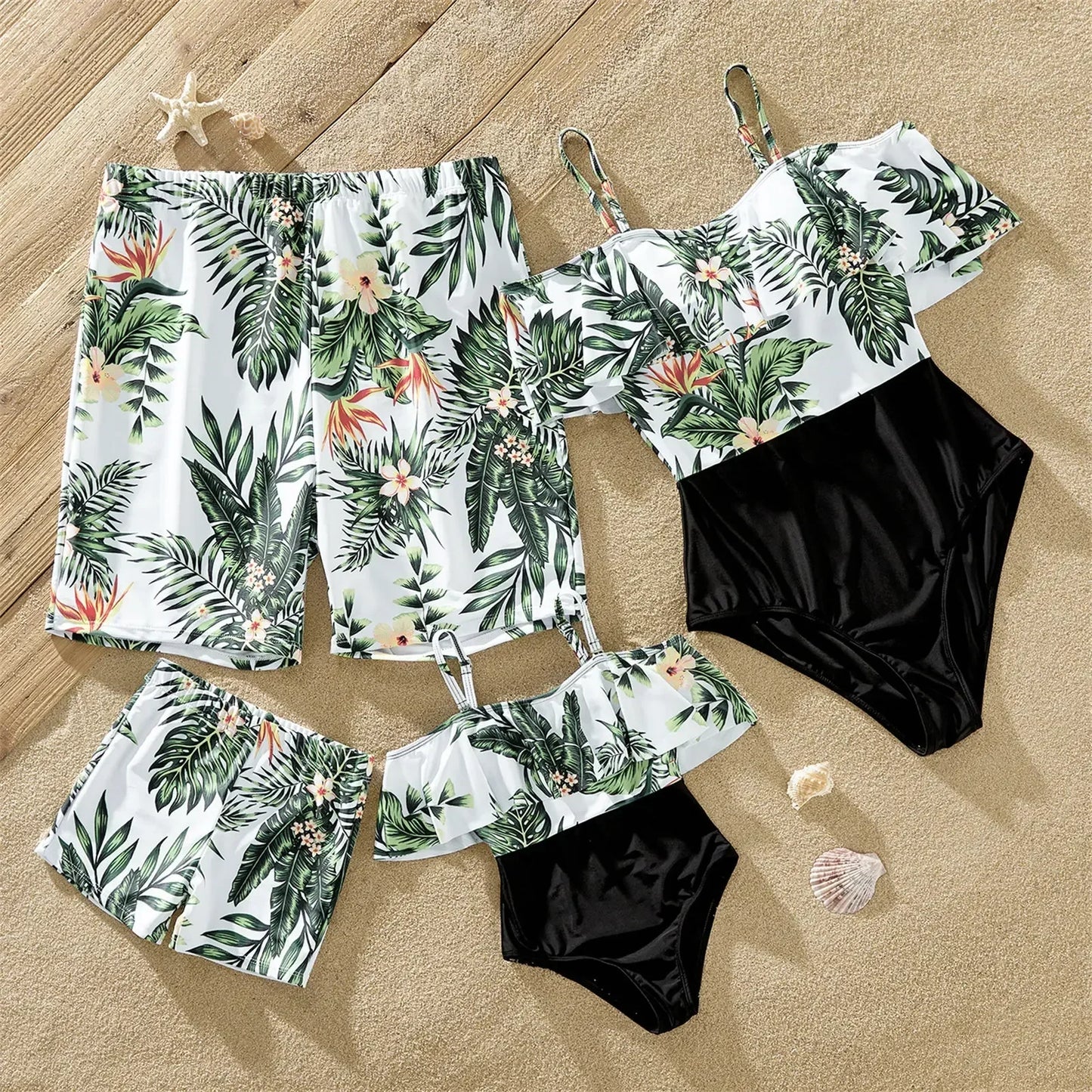 Family matching plant print swimsuit set on a beach, tropical summer outfits for parents & kids