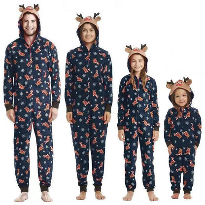 Toddler in a cute reindeer jumpsuit pajama, part of a family matching Christmas sleepwear set
