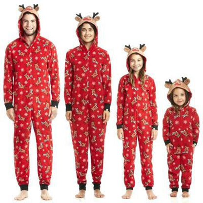 Adult wearing a festive reindeer print jumpsuit pajama, perfect for family Christmas celebrations