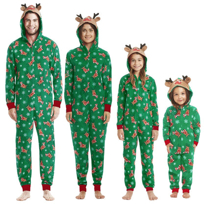Full family (dad, mom, child) in matching reindeer jumpsuit pajamas, cozy holiday fashion