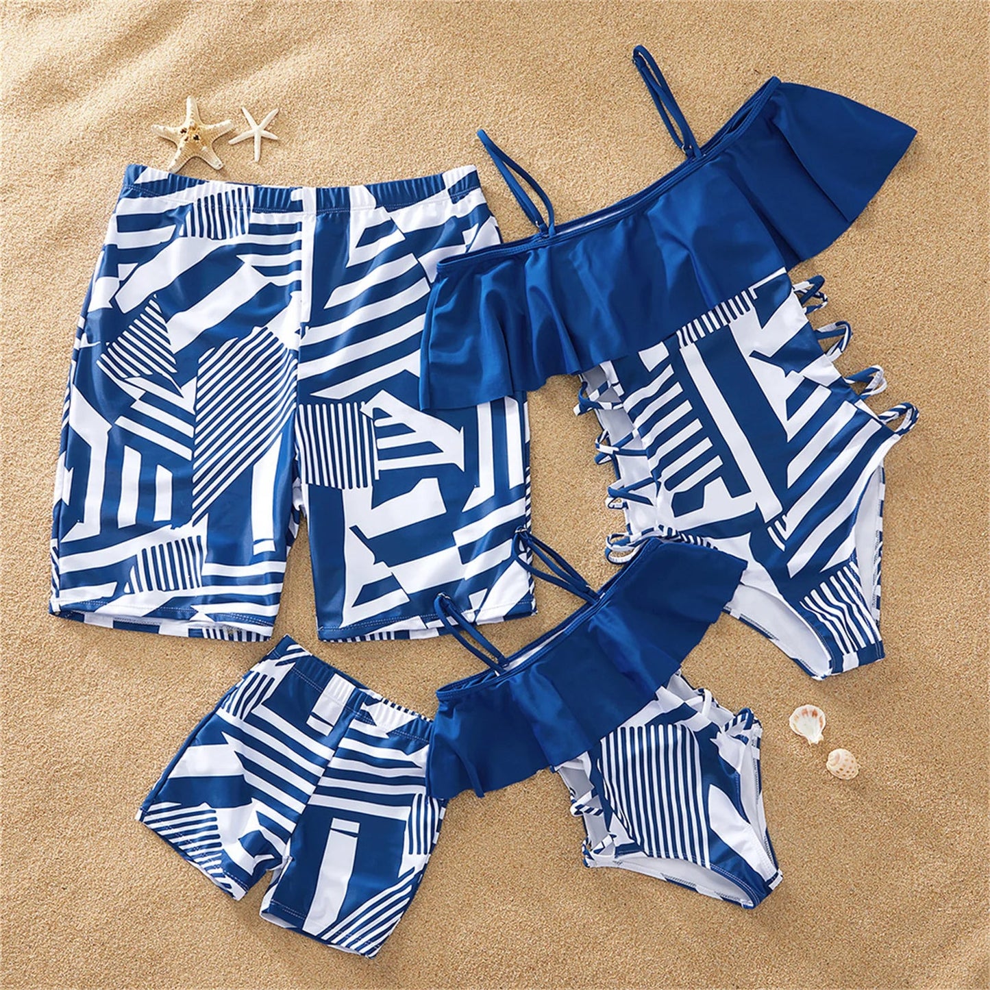 Family matching ruffled one-piece swimsuits in blue, perfect for summer beach fun
