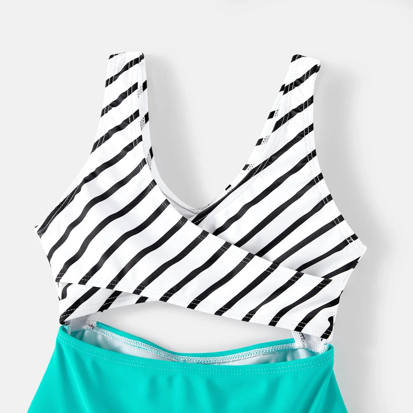 Striped family swimwear designed for comfort and style during summer relaxation