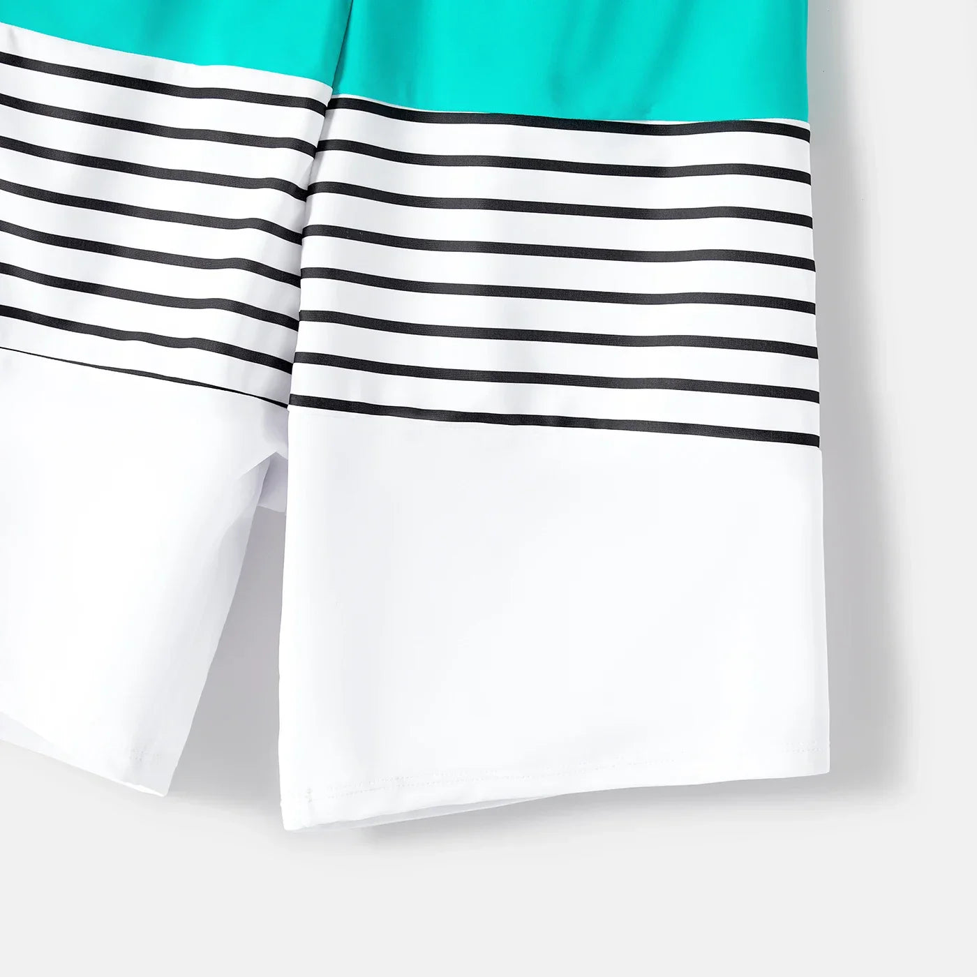 Matching striped swimsuits, perfect holiday gift for families who love beach trips