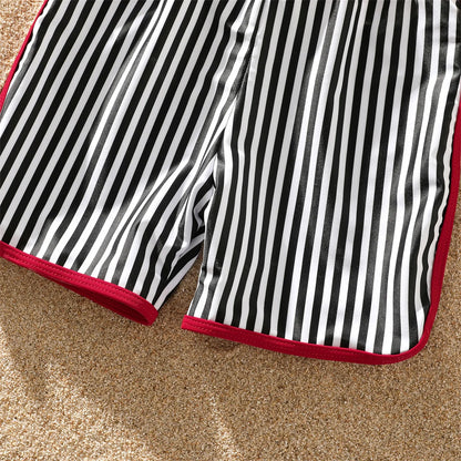Family matching striped swimwear set, vacation essential for a coordinated beach look.