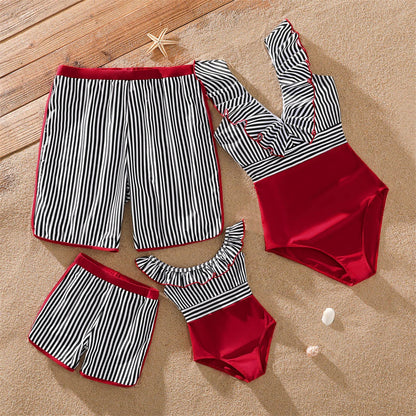 Adorable kids' striped swimsuit for boys and girls, coordinating with family beachwear.