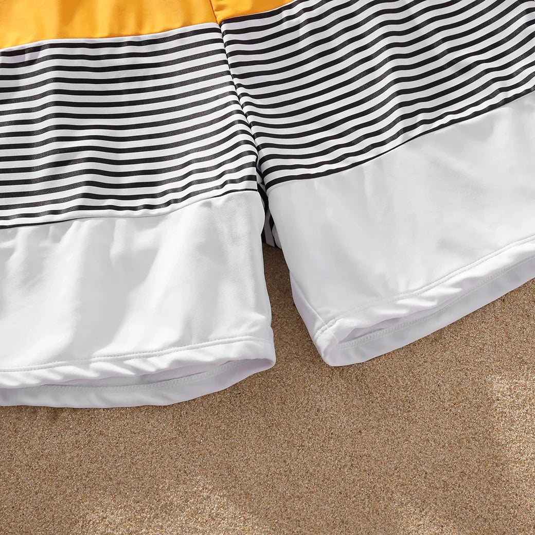Striped women's bikini top and bottom, part of a family matching swimwear collection, stylish beachwear