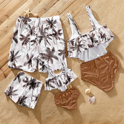 Kids' coconut tree print swimwear for boys and girls; matching family beach vacation outfits