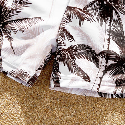 Detail of the coconut tree pattern on family matching beachwear; high-quality swimwear fabric
