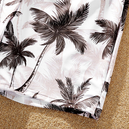 Stylish coconut tree print matching swimsuits for the whole family; khaki and tropical design