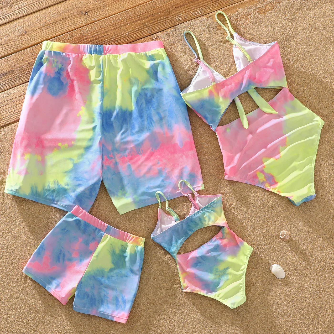 Mother and daughter in colorful tie-dye V-neck one-piece swimsuits