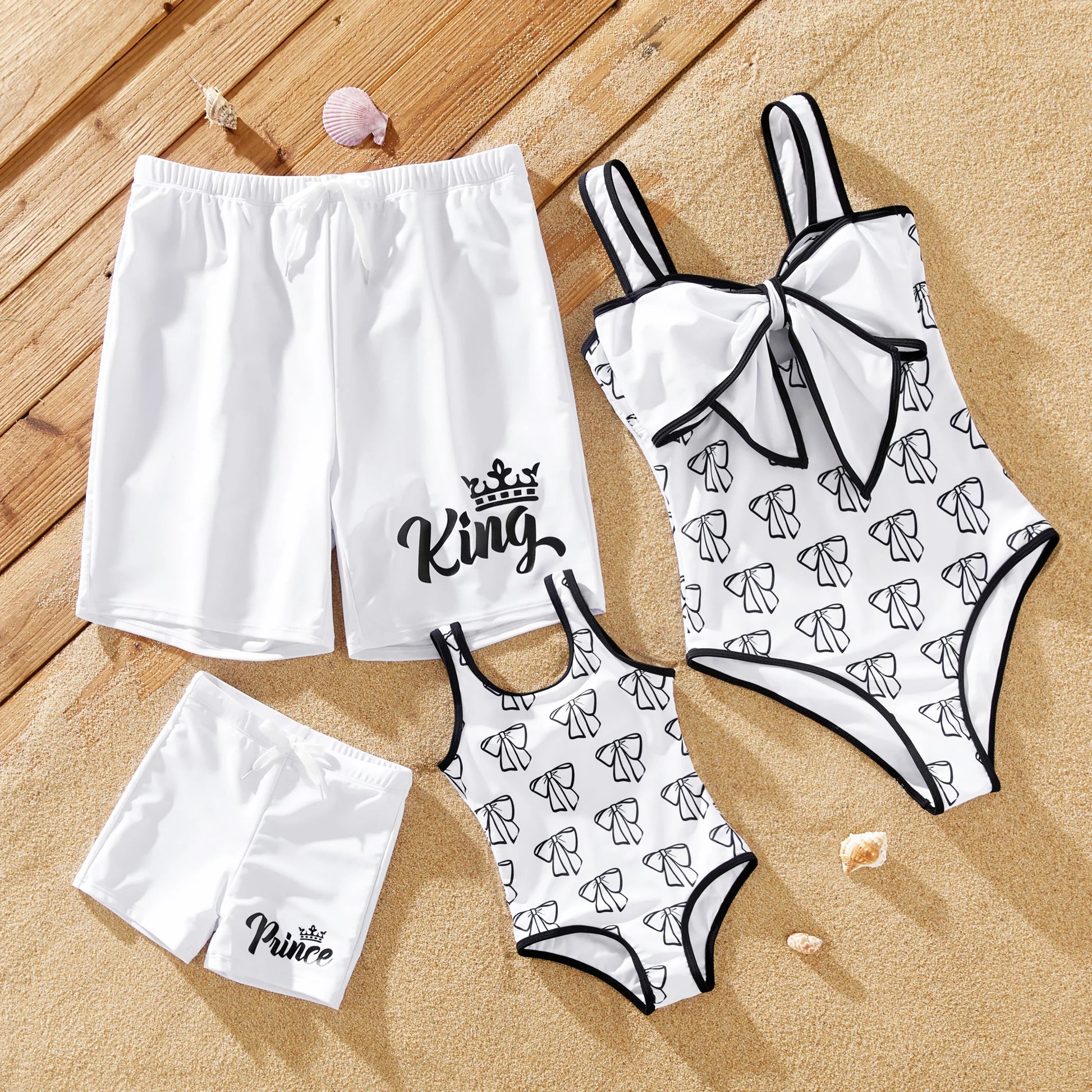 Family matching white swimwear set; bow swimsuit for mom/daughter, drawstring trunks for dad/son.