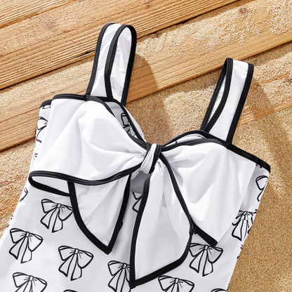 White polyester spandex family swimwear, perfect for pool wear and beach holidays.