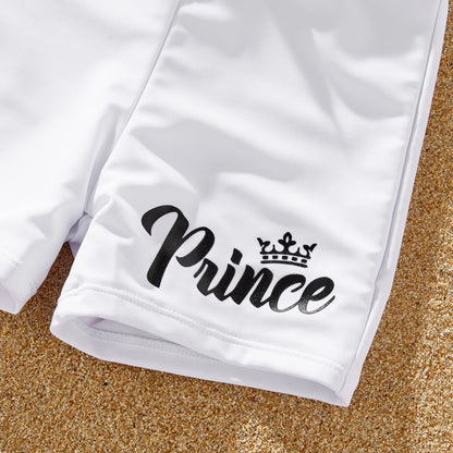 Close-up of white letter print bow swimsuit, part of a family matching swimwear set.