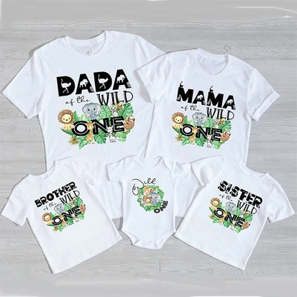 Adult, kid, and baby 'Wild One' jungle theme matching outfits for a fun family party