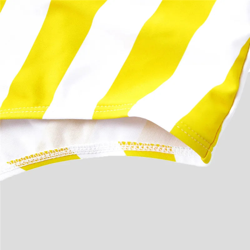 Men's yellow striped swim trunks, perfect for family pool days or beach holidays, quick-dry material.