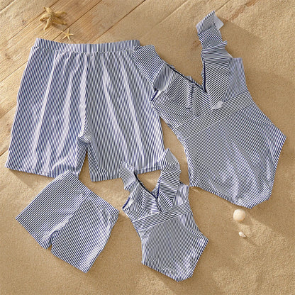 Matching family swimwear: striped V-neck flounce swimsuit for women, swim trunks for men, and kids' swimwear