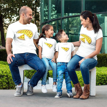 Family wearing matching pizza print cotton blend t-shirts for adults, kids, and baby, having fun outdoors.