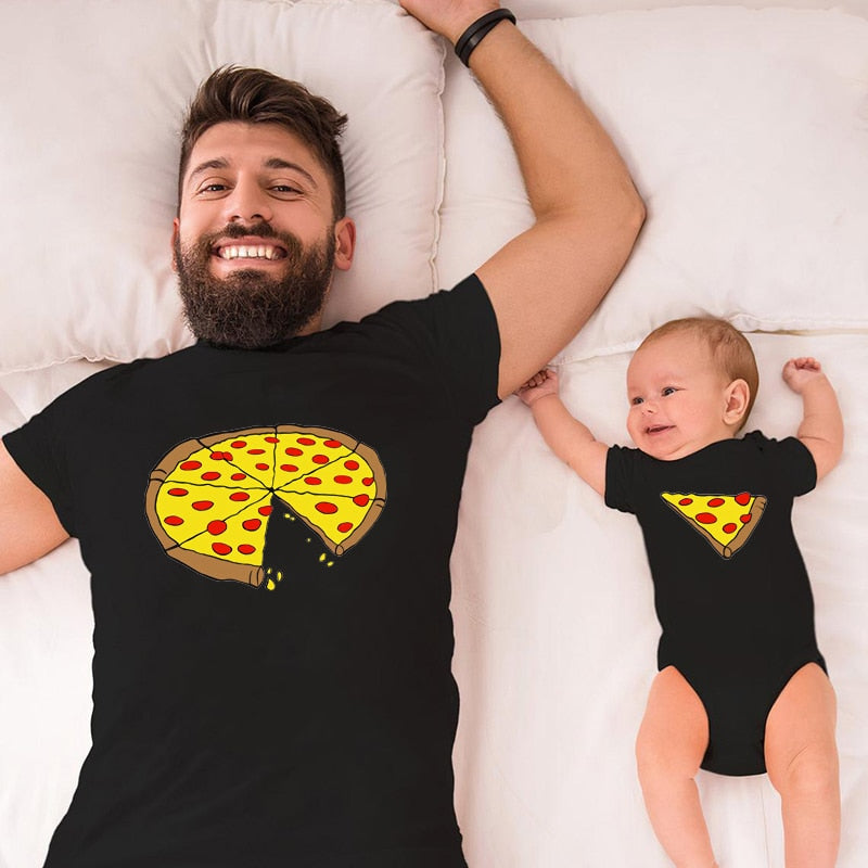 Close-up of a baby wearing a matching pizza print cotton blend onesie, part of a family outfit set.
