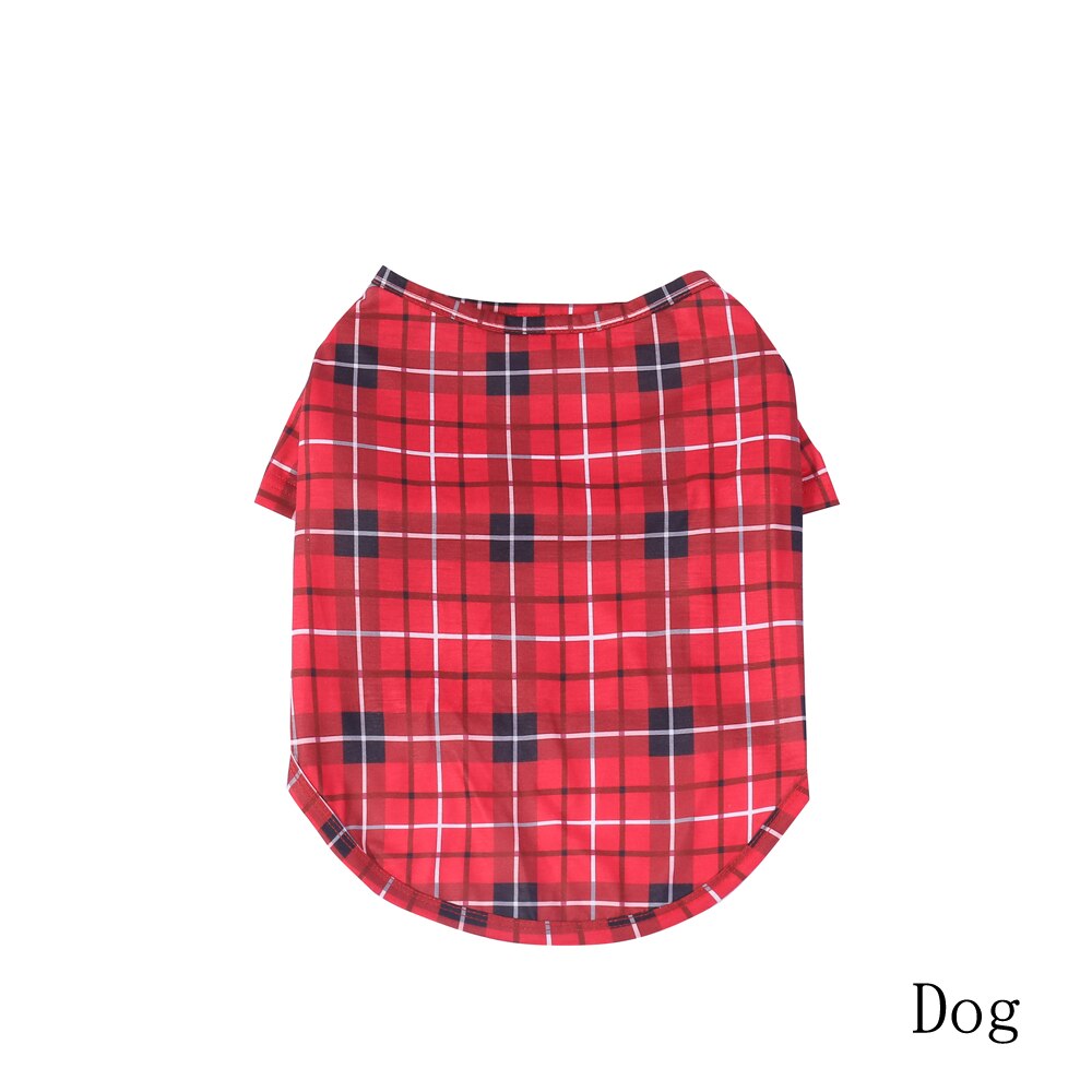 Flat lay of a complete family plaid pajama set, including adult, kid, and pet sizes, ready for the holidays.