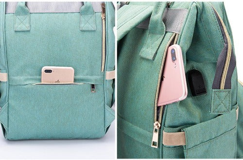 Interior view of organized Fit-All Unisex Diaper Backpack with multiple compartments