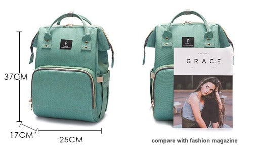 Fit-All baby travel bag styled on a stroller, demonstrating stroller clips functionality
