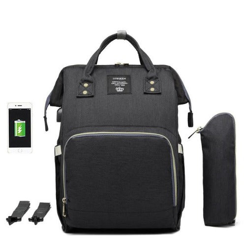 Side view of Fit-All diaper backpack, showcasing insulated bottle pockets