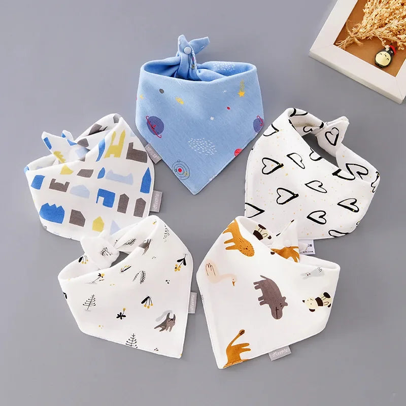 Brightly colored cotton baby bib with a playful cartoon character, perfect for young children