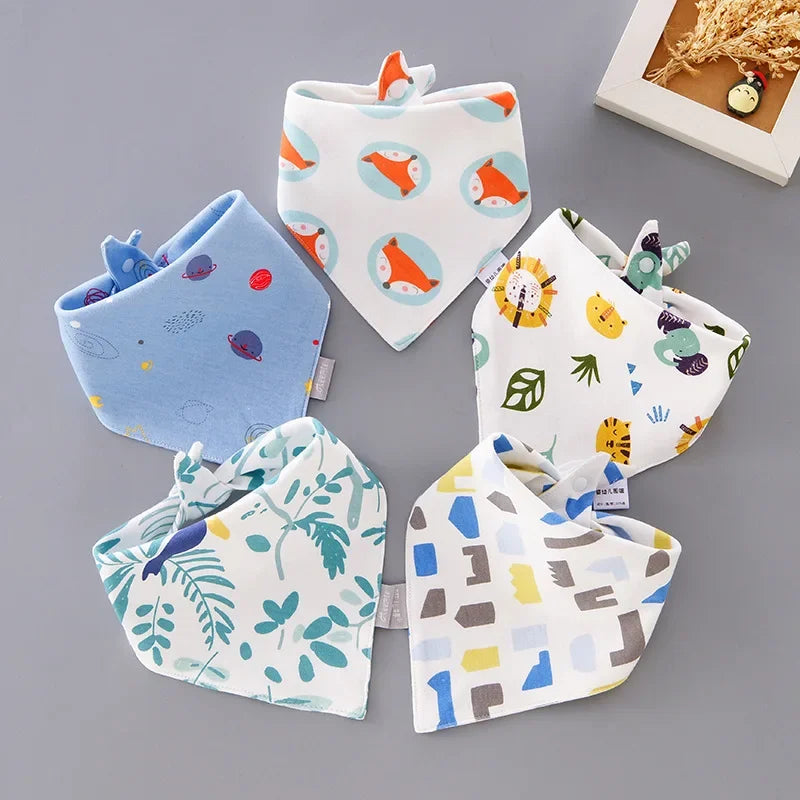 Set of five absorbent cotton bibs featuring various cartoon designs, durable and easy to clean
