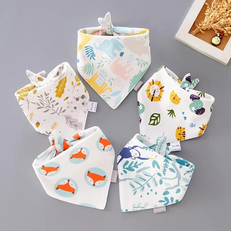 Green cartoon cotton baby bib with snap closure, ideal as a burp cloth or saliva towel