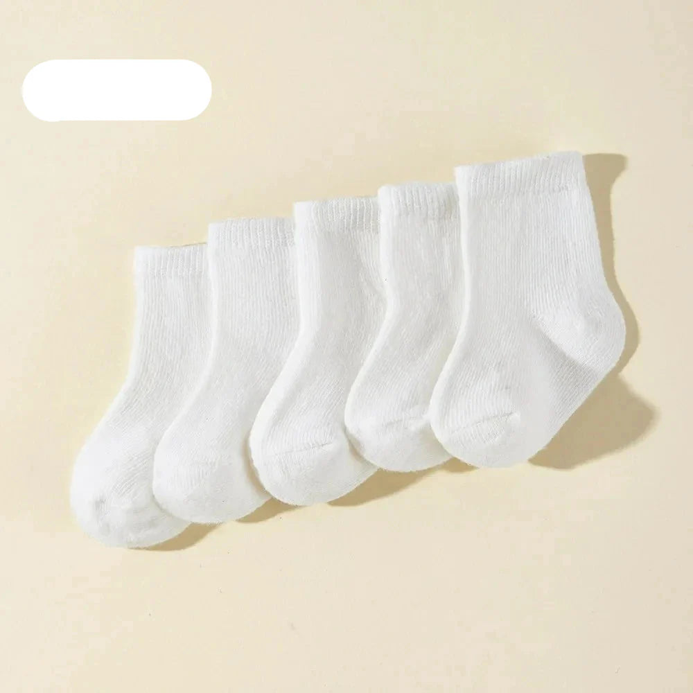 Five pairs of breathable cotton baby socks for infants and toddlers with star patterns, perfect for spring and autumn.