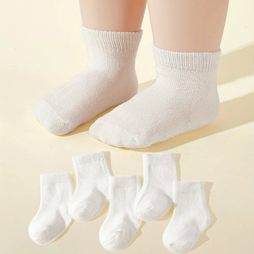 Close-up of soft, breathable cotton baby socks in a 5-pair pack, ideal for newborns and young babies.