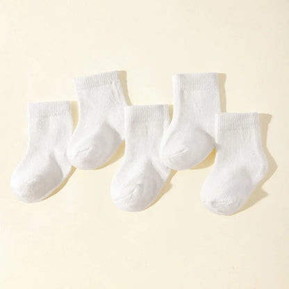 Collection of five pairs of quality breathable cotton baby socks, essential baby clothing accessories.