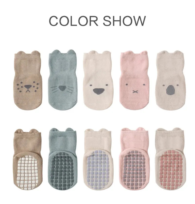 Unisex anti-slip baby socks in a pack of five, featuring different vibrant cartoon designs