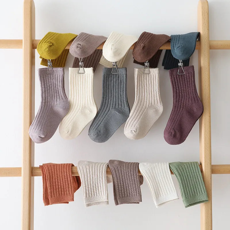 Five pairs of colorful cotton blend unisex kids socks, soft and breathable for toddlers.