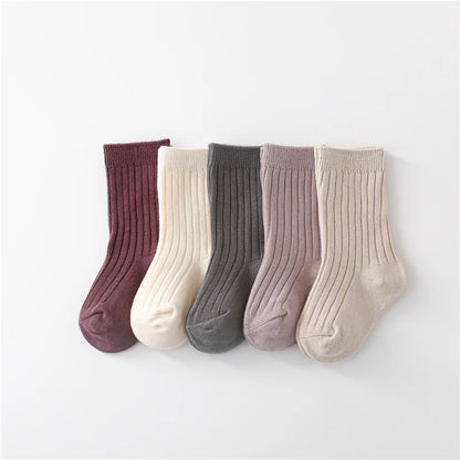 Assortment of five pairs of vibrant cotton blend toddler socks, ideal for daily wear.