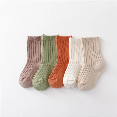 Five pack of unisex baby accessories: colorful, soft, and breathable cotton blend socks.