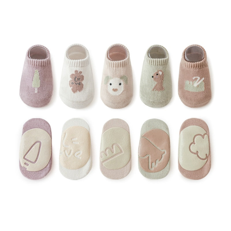 Five pairs of colorful non-skid ankle socks for children, perfect for active toddlers.