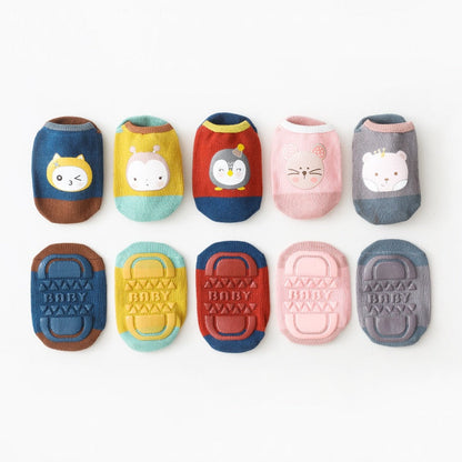 Five-pair set of soft cotton non-skid ankle socks for babies and toddlers, in various bright colors.